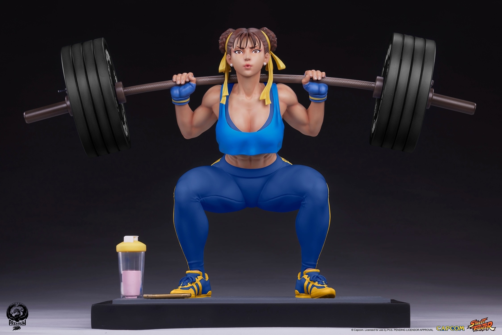 This high quality Street Fighter statue depicts Chun-Li powerlifting mad  weight and it's available for pre-order now